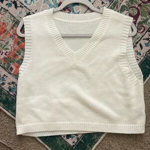 White sweater vest